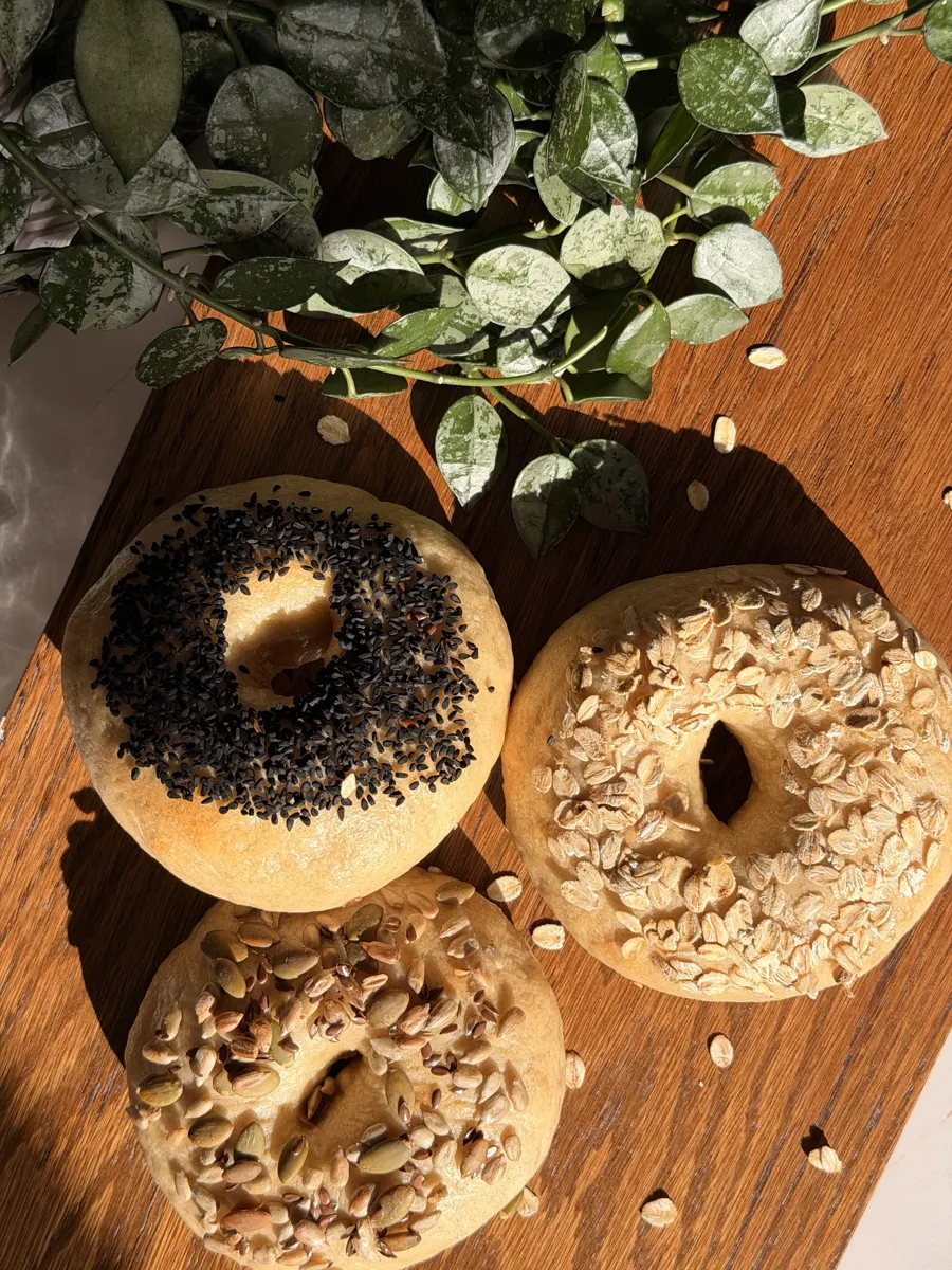 Baraké sourdough bagels topped with black seed, oats and seeds