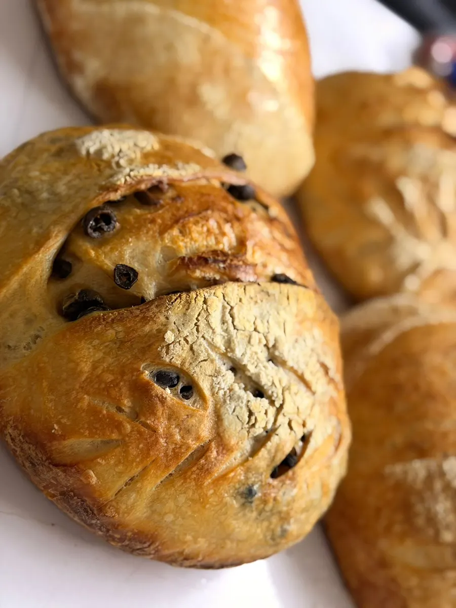 Baraké olive sourdough loaves studded with olives